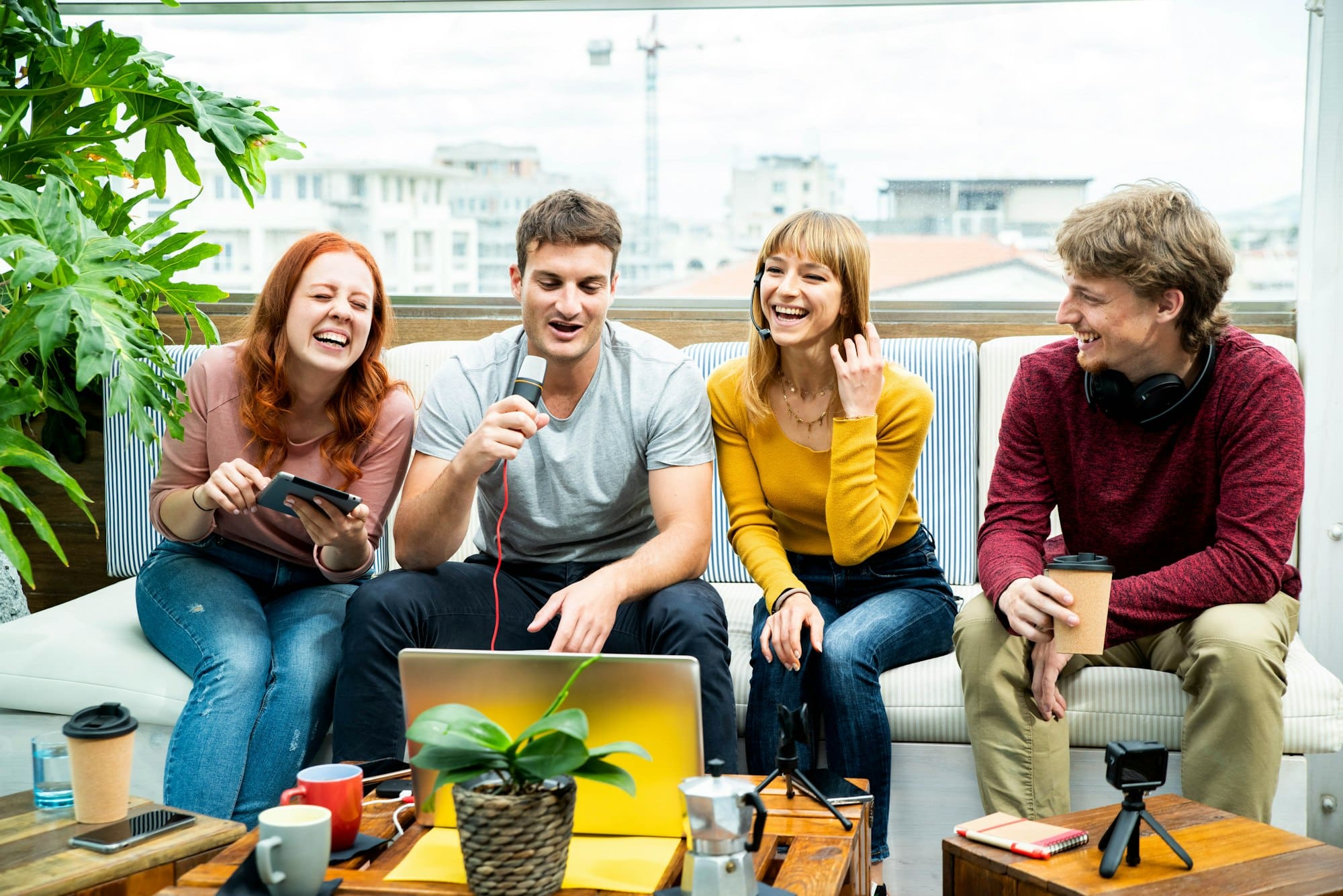 Millennial creative streamer group recording video broadcasting live on social media platforms