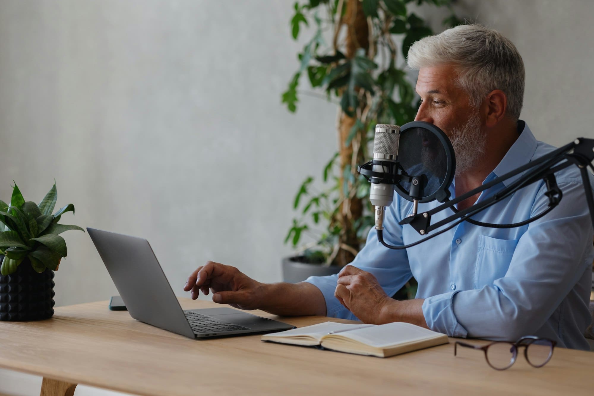 reate audio content for advertising or a blog, male podcaster