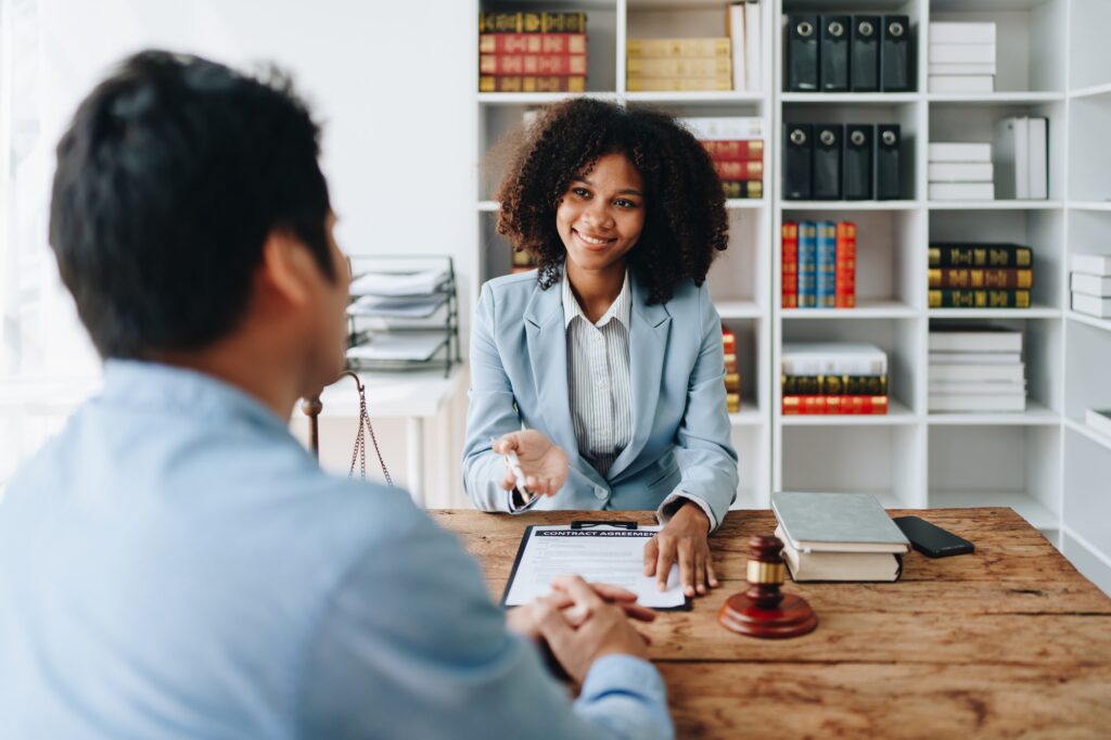 african american attorney, lawyers discussing contract or business agreement at law firm office, Bus